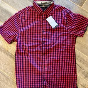Brand new button down sleeveless shirt! Unused with tag!
